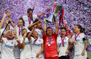 happy football women with a trophy