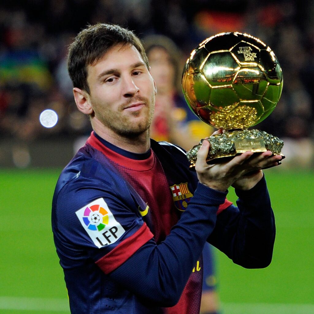 a picture a best footballer with a trophy